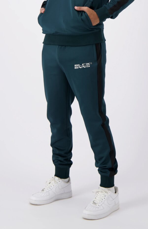 BLACK BANANAS Pantalon " EXPLORER TRACKPANTS " color verde