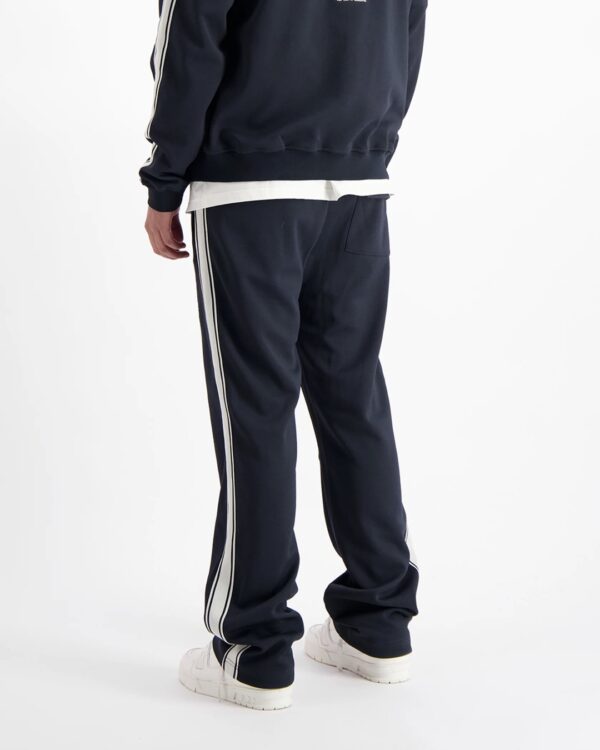BLACK BANANASPantalones"MONOGRAM TRACKPANTS"color marino