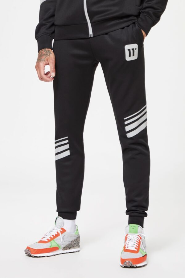11 DEGREES Pantalon " Stripe Print Trackpants " color negro
