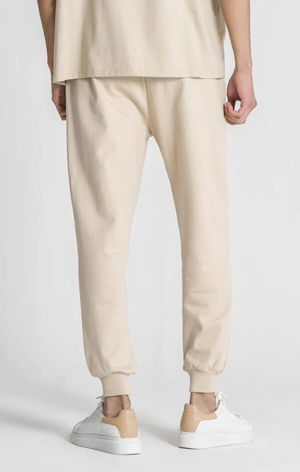 GIANNI KAVANAGH Pantalon " Beige Laced Loose Joggers  " color beige